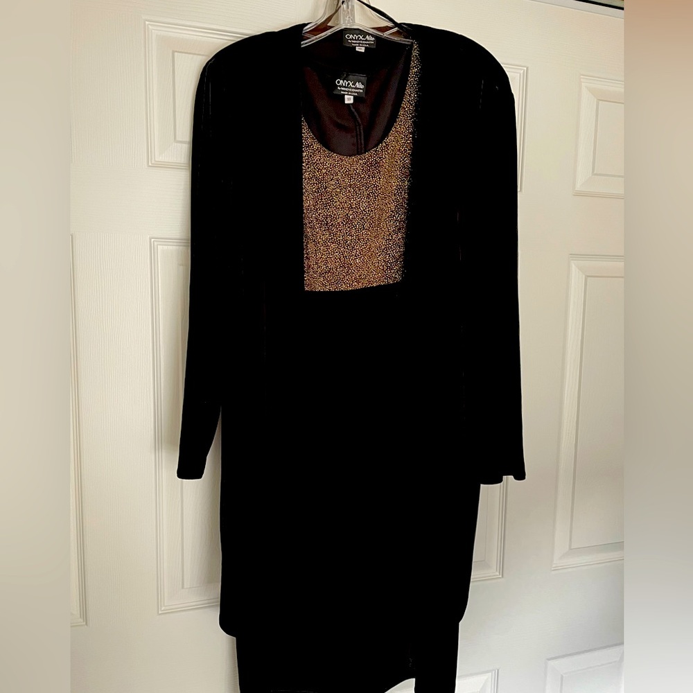 Sleeveless formal black velvet dress with gold sparkle and cover up.